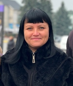 Олена Гріх.