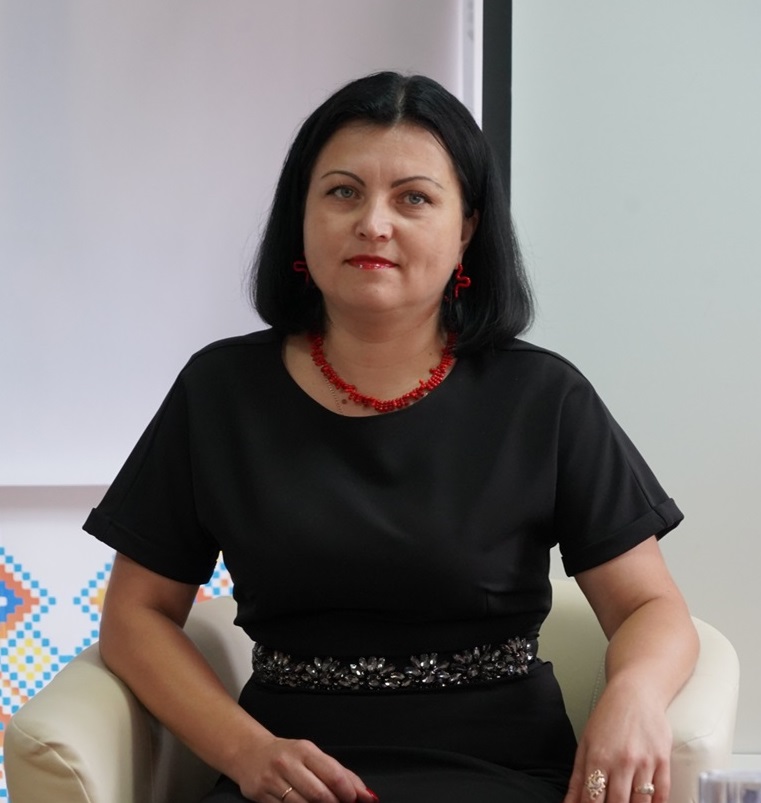 Олена Гріх.